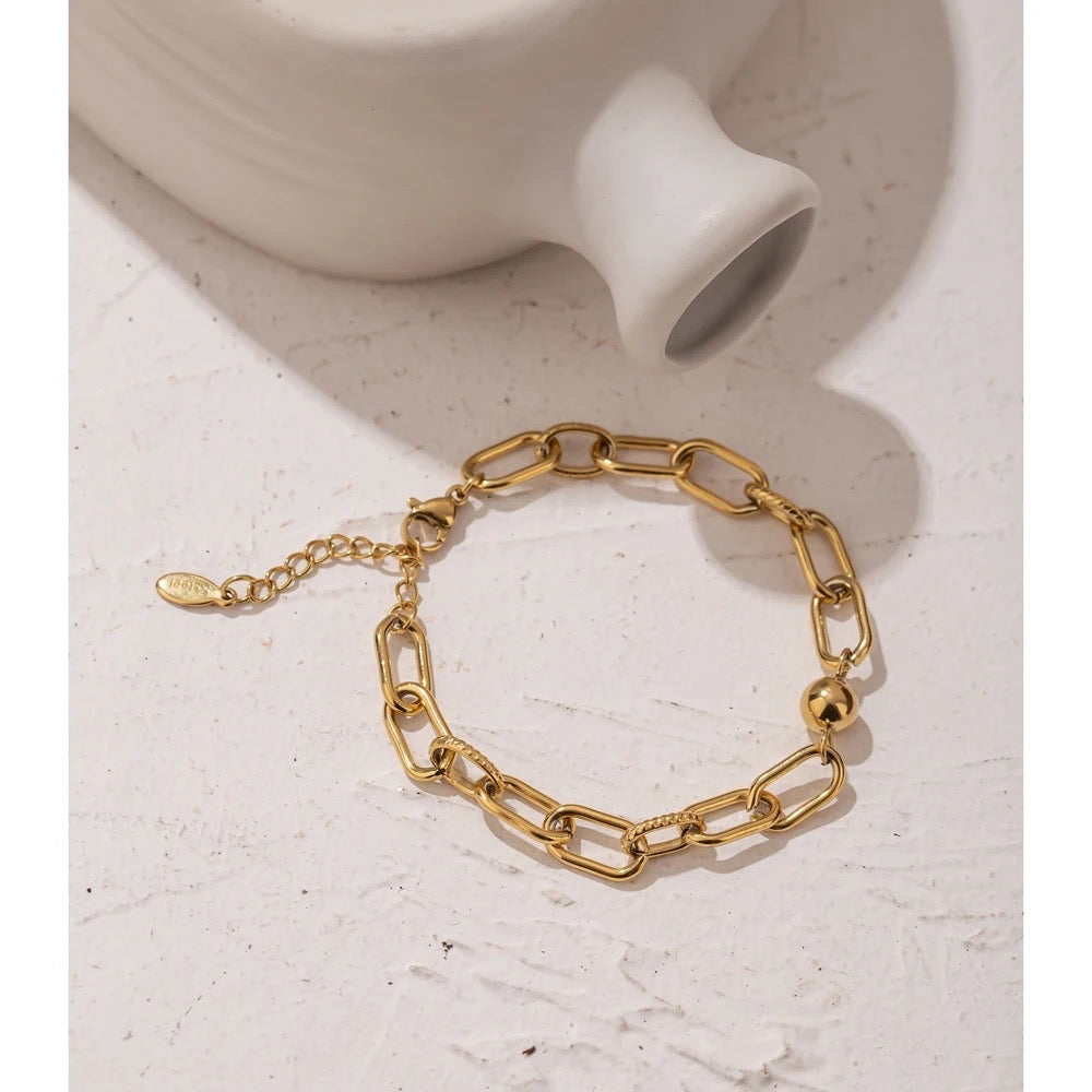 Ball with paper clip bracelet