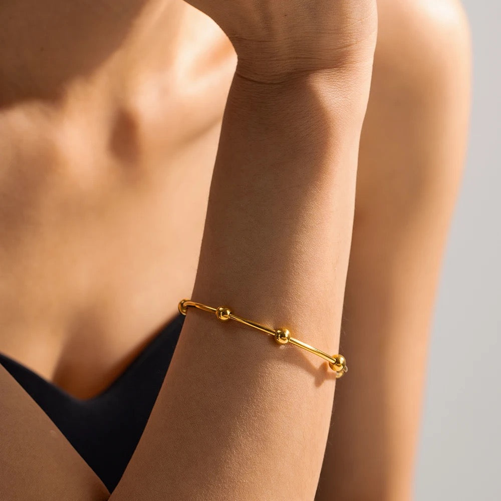 Gold beads bangle