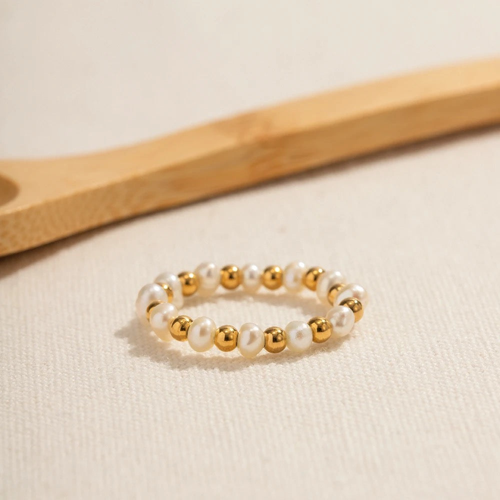 Elastic pearl and bead ring