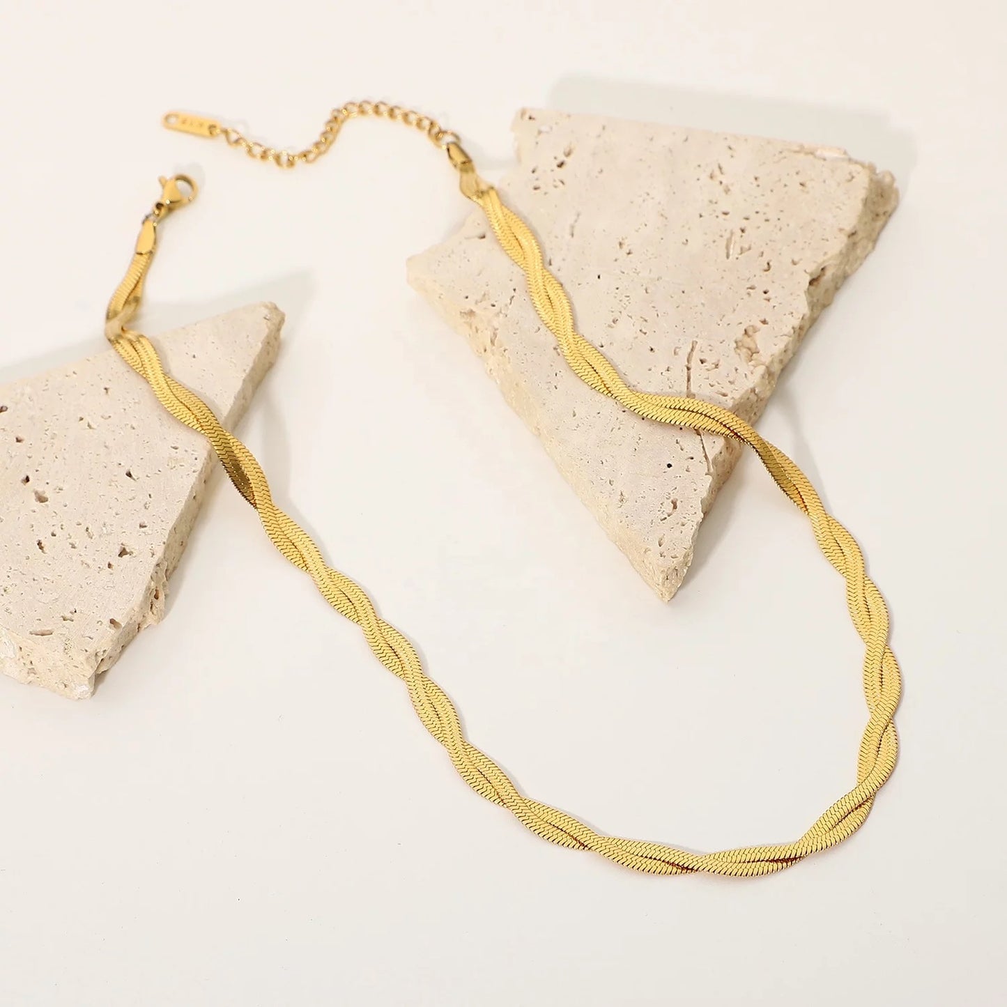 Crossed snake chain necklace