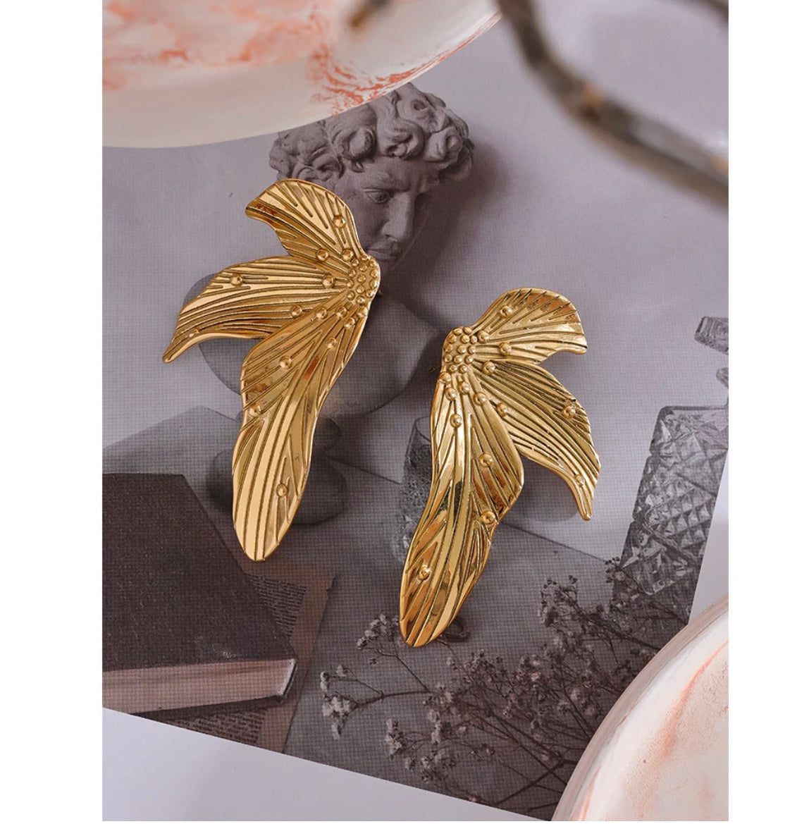 Leaf statement stud earrings