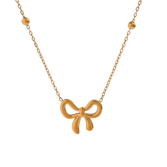 Gold bow pedant necklace