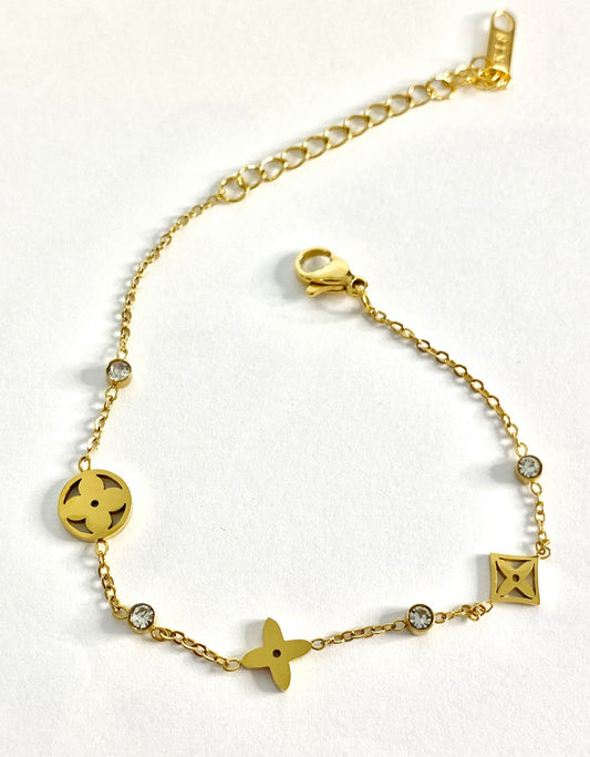 Gold clovers bracelet