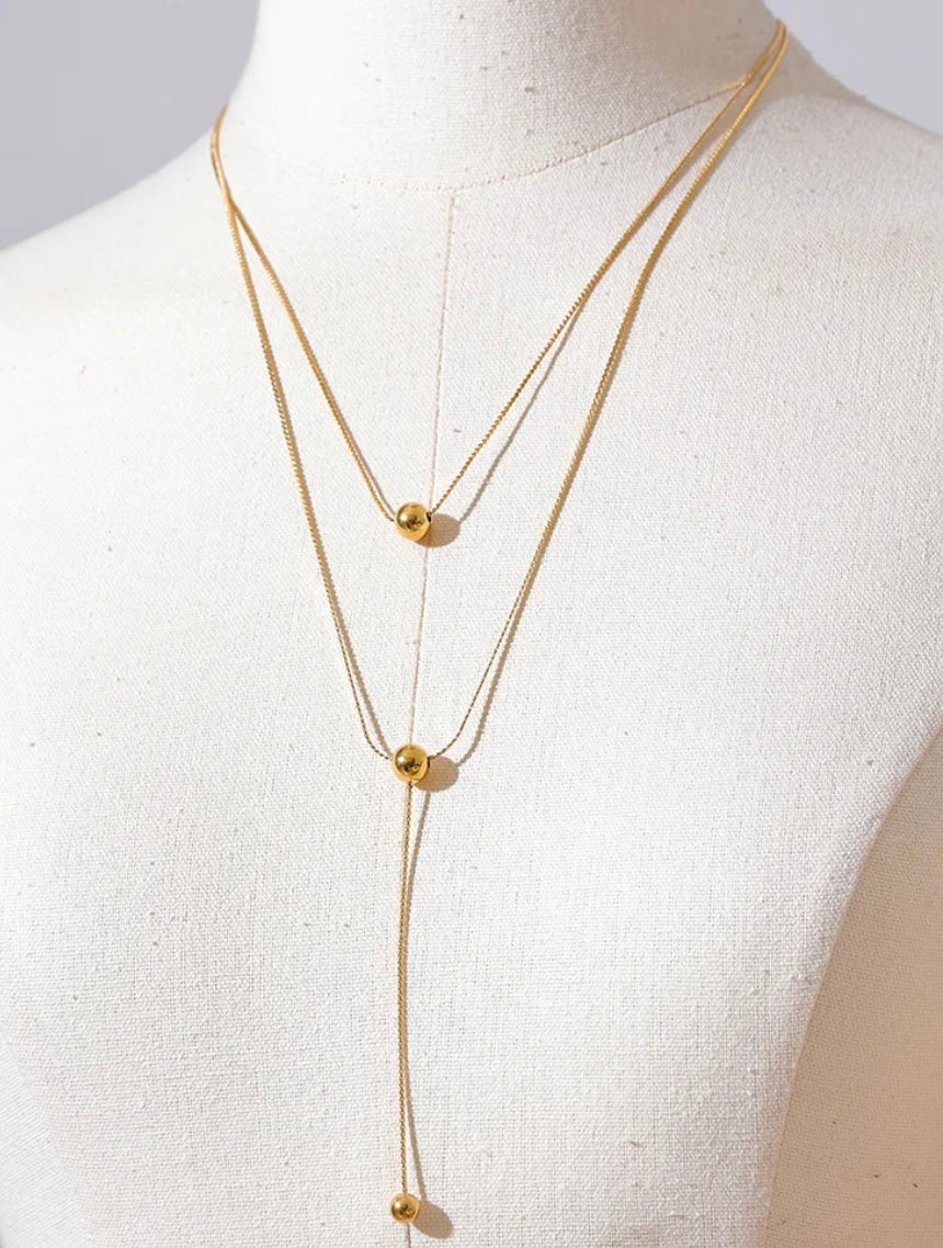 Round bead long layered necklace
