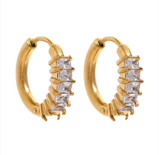 White huggie hoop earrings