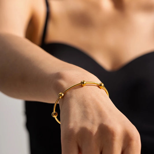 Gold beads bangle