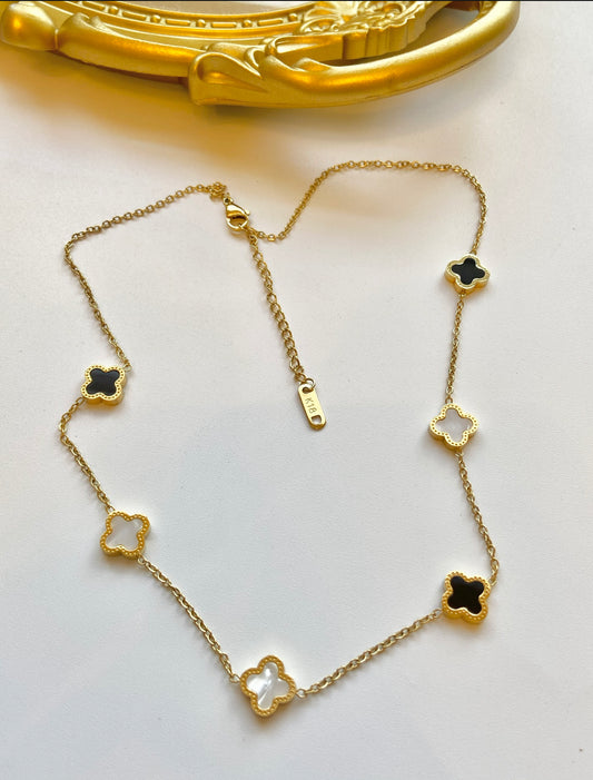 Black and white clover necklace