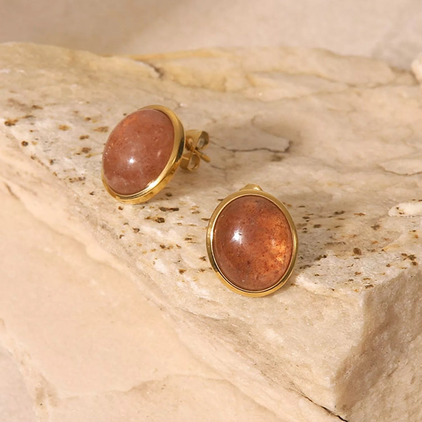 Oval strawberry quartz stud earrings
