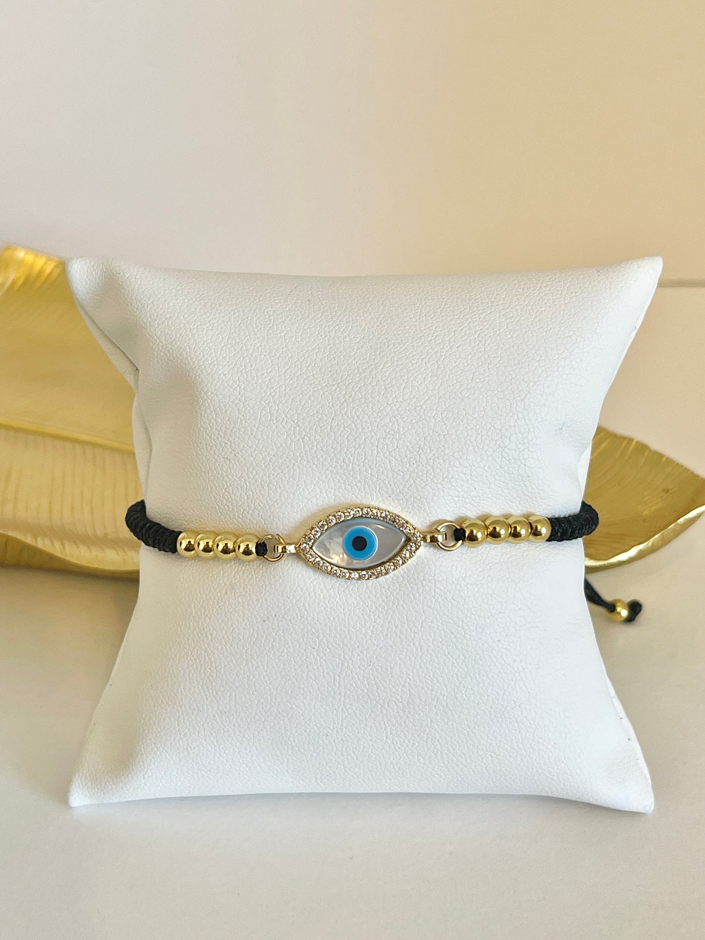 Evil eye string bracelet